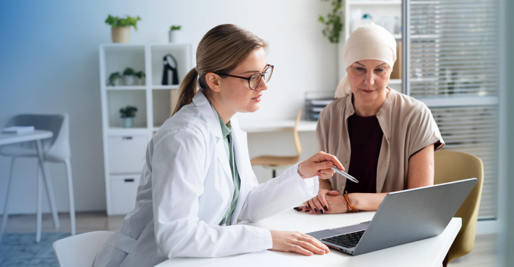 oncologist discussing breast cancer recurrence risk and follow up care with patient