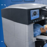 Ophthalmologist performing LASIK laser eye surgery procedure