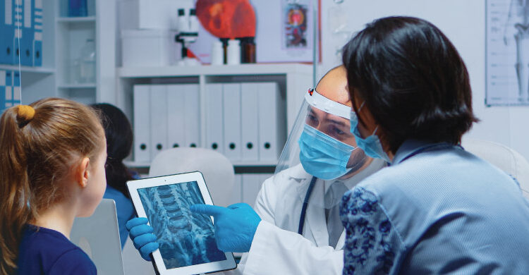 technology in nursing showing nurse using digital system for patient care