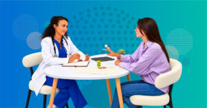 Woman discussing GLP-1 medication and pregnancy planning with a healthcare professional during a preconception consultation.