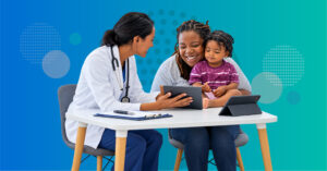 pediatrician discussing child screen time with parent and assessing tablet use for tantrums meals bedtime behavior and family routines