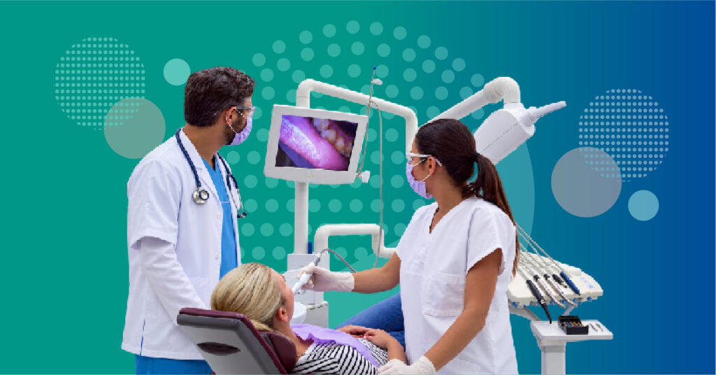 dentist and doctor coordinating care with a patient around oral health systemic conditions and treatment planning